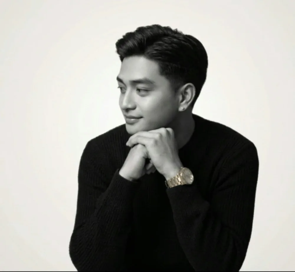 Mark Jaron R. Marigondon in a studio portrait